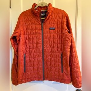 Patagonia Men’s Nano Puff Jacket Size Medium.  Good condition, minor wear&  tear